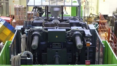 Plastic container making machine Stock Footage 76901171