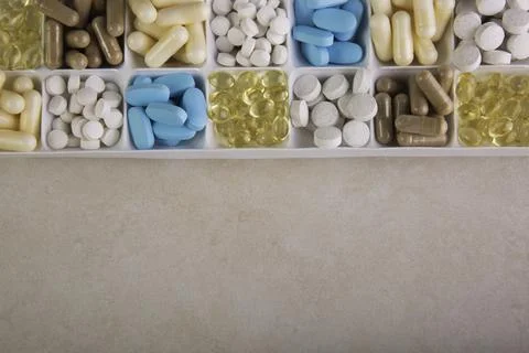 Plastic container with pills on white background Stock-Fotos