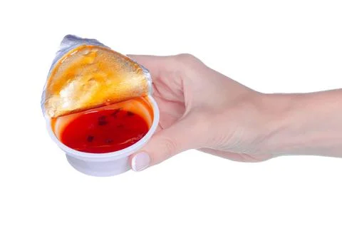 Plastic container with sauce Stock Photos