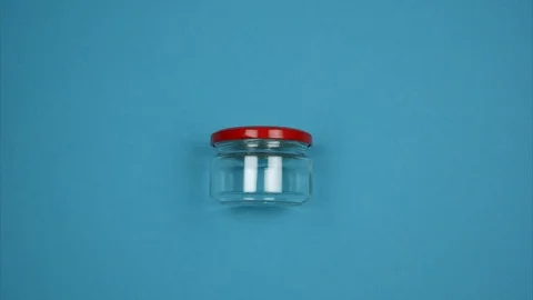 The plastic container turns into glass. Stop motion Video stock 124422431