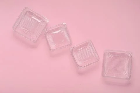 Plastic containers for food on pink background, top view Stock Photos