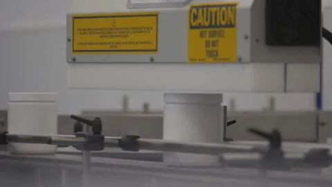 Plastic Containers Moving on Assembly Line Stock Footage 137282340