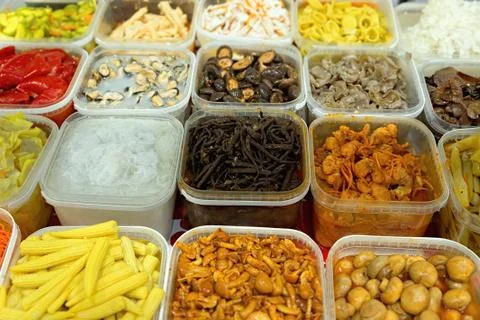 Plastic containers with pickled vegetables. Stock Photos