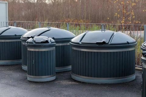 Plastic containers for separate waste collection. Bins for garbage separation Stock Photos