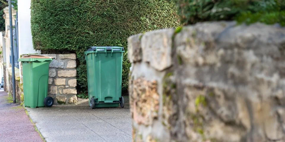 Plastic containers for separate waste collection on the street. Bins for garb Stock Photos