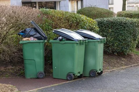 Plastic containers for separate waste collection on the street. Bins for garb 写真素材