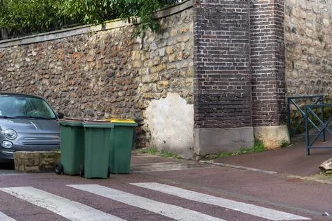 Plastic containers for separate waste collection on the street. Bins for garb 写真素材