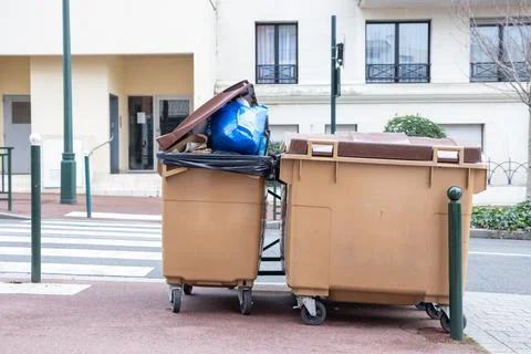 Plastic containers for separate waste collection on the street. Bins for garb 写真素材