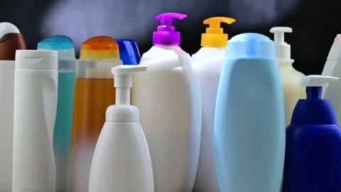 Plastic containers of shampoos and shower gels Stock Footage 280272005
