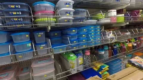 Plastic containers on shelf Stock-Footage 72840129