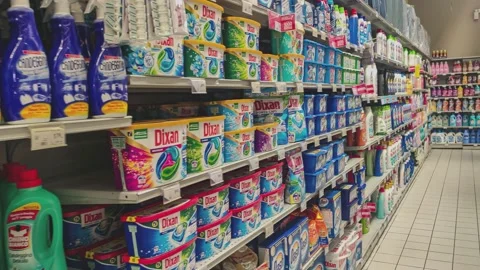 Plastic containers of Tide brand liquid laundry detergent in a supermarket ai 스톡 동영상 164553374