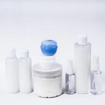 Plastic containers without labels for brand advertising on a white background. Stock Photos