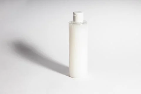 Plastic containers without labels or brand on a white background. Stock Photos