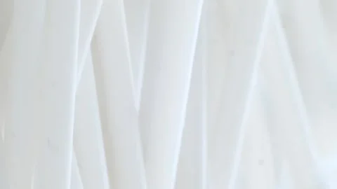 Plastic cotton swabs on a white background. Vertical video Stock Footage 250028462
