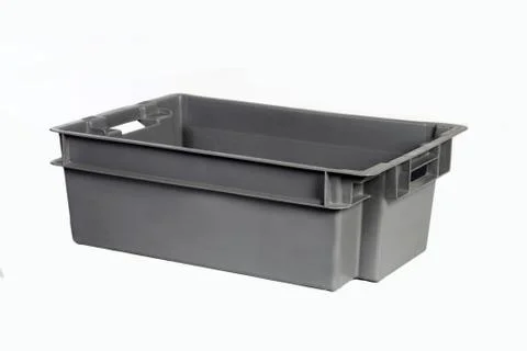 Plastic crate grey a Stock Photos