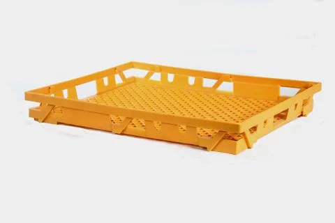 Plastic crate yellow Stock Photos