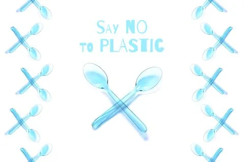 Plastic crossed spoons with text Stock Photos