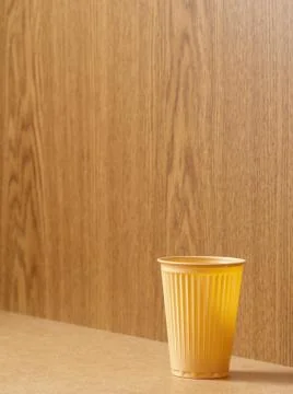 Plastic cup on a desk Stock Photos