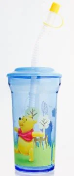 Plastic cup with drinking straw Stock Photos