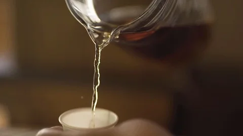 Plastic cup, pouring tea, stock video Stock Footage 88225673