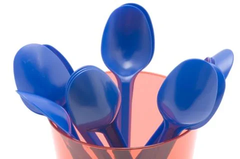 Plastic cup with spoon Stock Photos