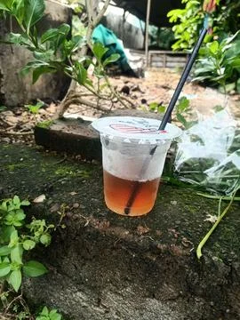 A plastic cup with a straw in it that says ' no drink ' on it Stock Photos