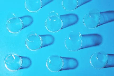Plastic cups on blue background. Foto stock