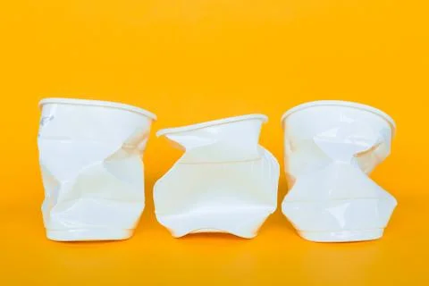Plastic cups into the garbage Stock Photos