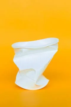 Plastic cups into the garbage 스톡 사진