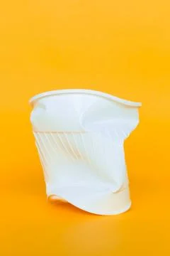 Plastic cups into the garbage Stock Photos