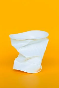 Plastic cups into the garbage Stock Photos