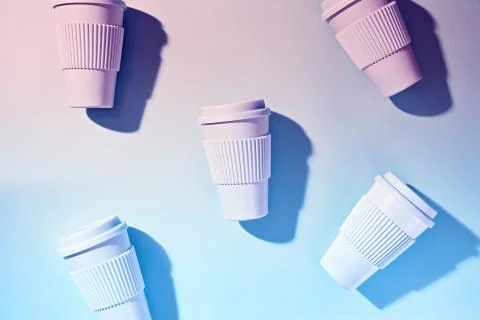 Plastic cups, mugs pattern top down. Stock Photos