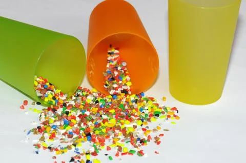 Plastic cups with regrind Stock Photos
