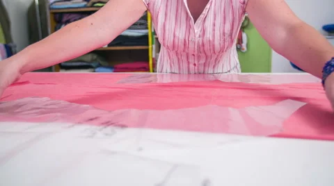 Plastic cut out for marking dress measures on textile close up Stock Footage 41012805