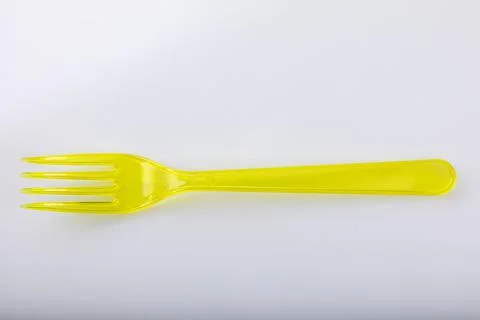 Plastic cutlery, colored fork, suitable for travel Stock Photos
