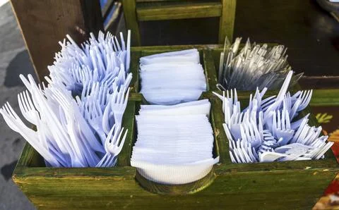Plastic cutlery . Disposable tableware. Stock Photos