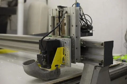 Plastic Cutting Machine. Panel Production. Flatbed Plotter Printed Head. Stock Photos