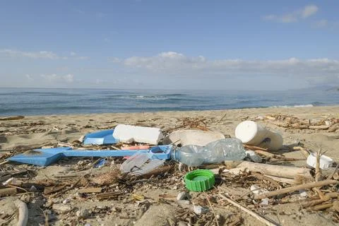 Plastic debris waste pollution trashed on sea coast ecosystem,nature damage Stock Photos