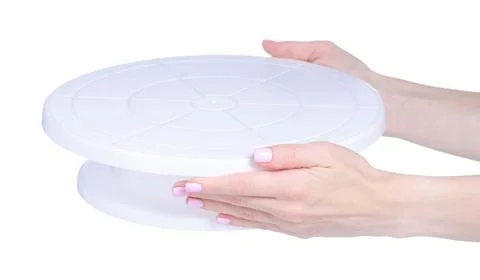 Plastic dessert cake stand in hand Stock Photos