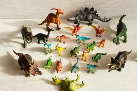 Plastic dinosaur figures of extinct ancient creatures and  favorite toys of k Stock Photos