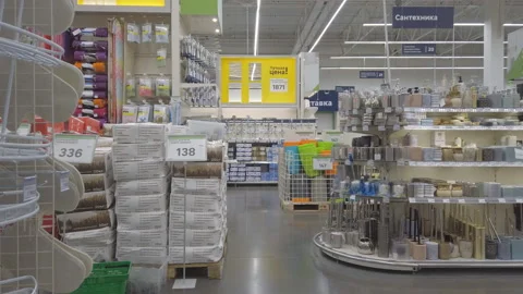 Plastic dishes and containers on a shelf in a hardware store Stock Footage 128811951