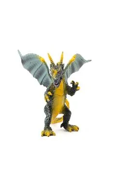 Plastic dragon toy on white background. The Simbol of new year 2024. Stock Photos