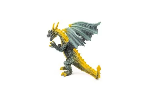 Plastic dragon toy on white background. The Simbol of new year 2024. Stock Photos