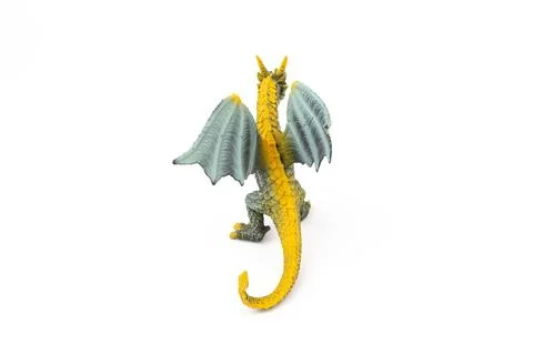 Plastic dragon toy on white background. The Simbol of new year 2024. Stock Photos