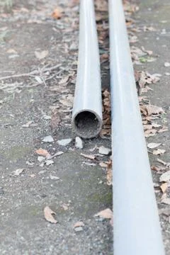 Plastic drain pipe filled with some mud Stock Photos