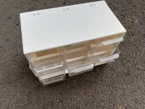 Plastic drawer for storing small items. Stockfoto's