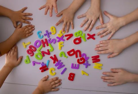 Plastic educational abc toy puzzle for kids. Children learning alphabet letters. Stock Photos