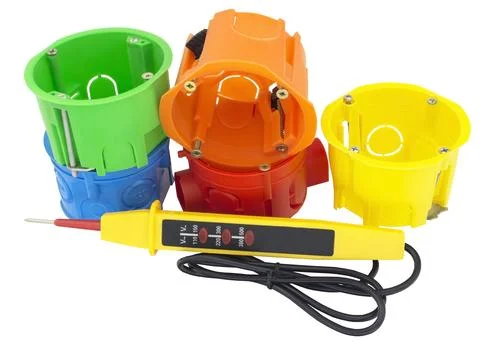 Plastic electrical junction box and Voltage tester Stock Photos