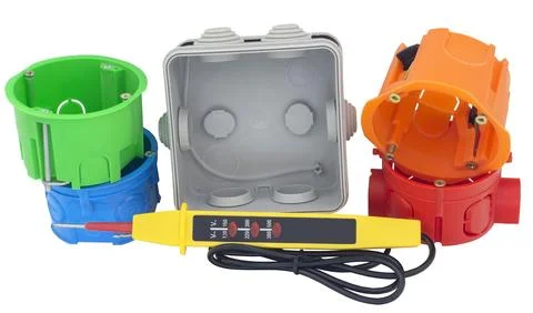 Plastic electrical junction box and Voltage tester Stock Photos