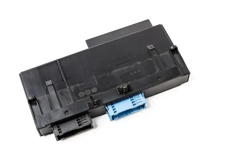 Plastic electronic control unit with black and blue connectors on a white iso Stock Photos